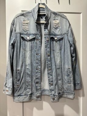 Light Blue Distressed Denim Jacket - Women’s